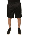 Shorts en jersey de polyester noir de Dolce & Gabbana, taille mi-haute, style décontracté et élégant.
