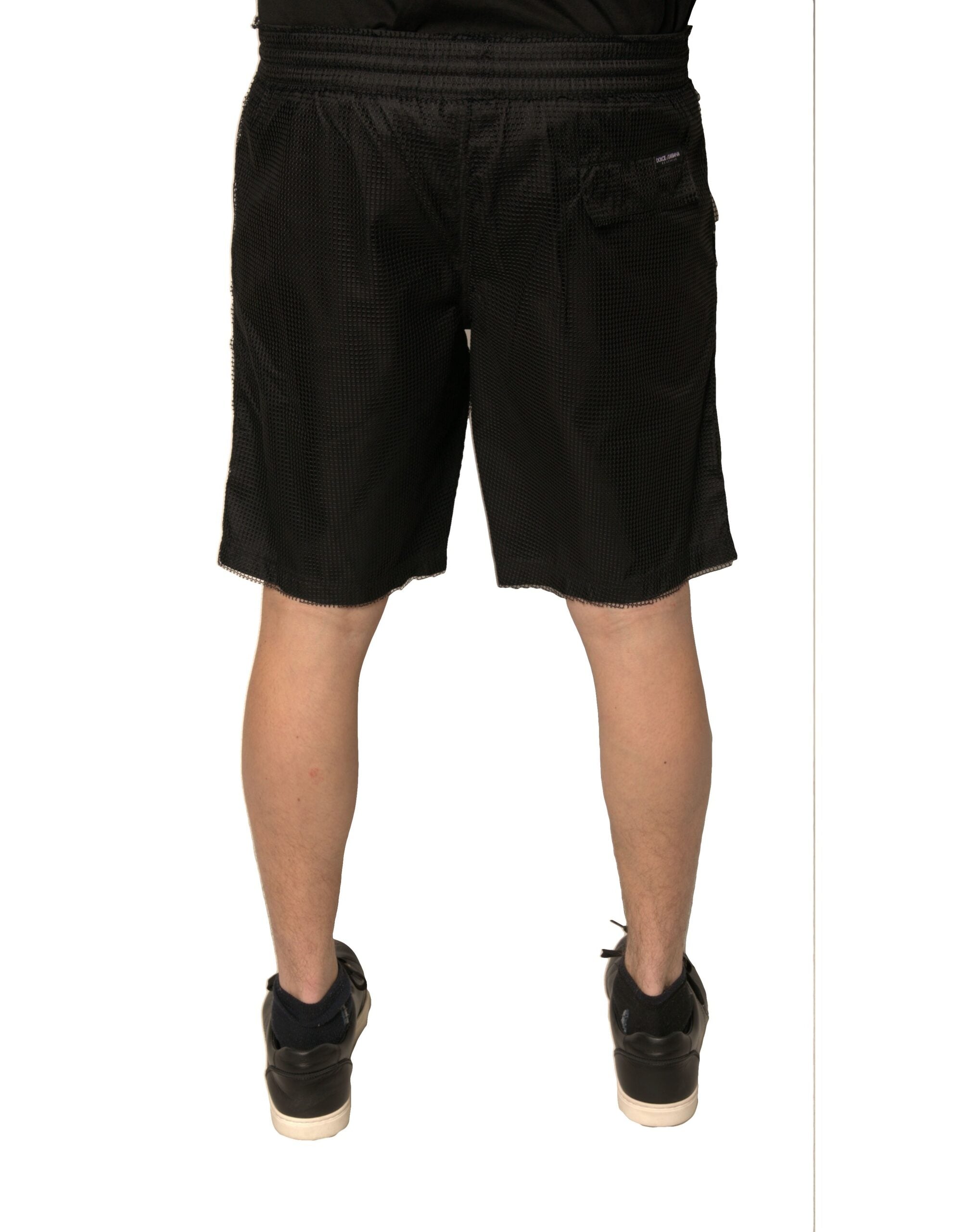 Shorts en jersey de polyester noir de Dolce & Gabbana, taille moyenne, mode élégante et confortable, vues sur le produit.