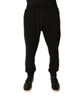 Pantalon de jogging noir en coton pour homme de Dolce & Gabbana, style décontracté avec cordons à la taille et poches.