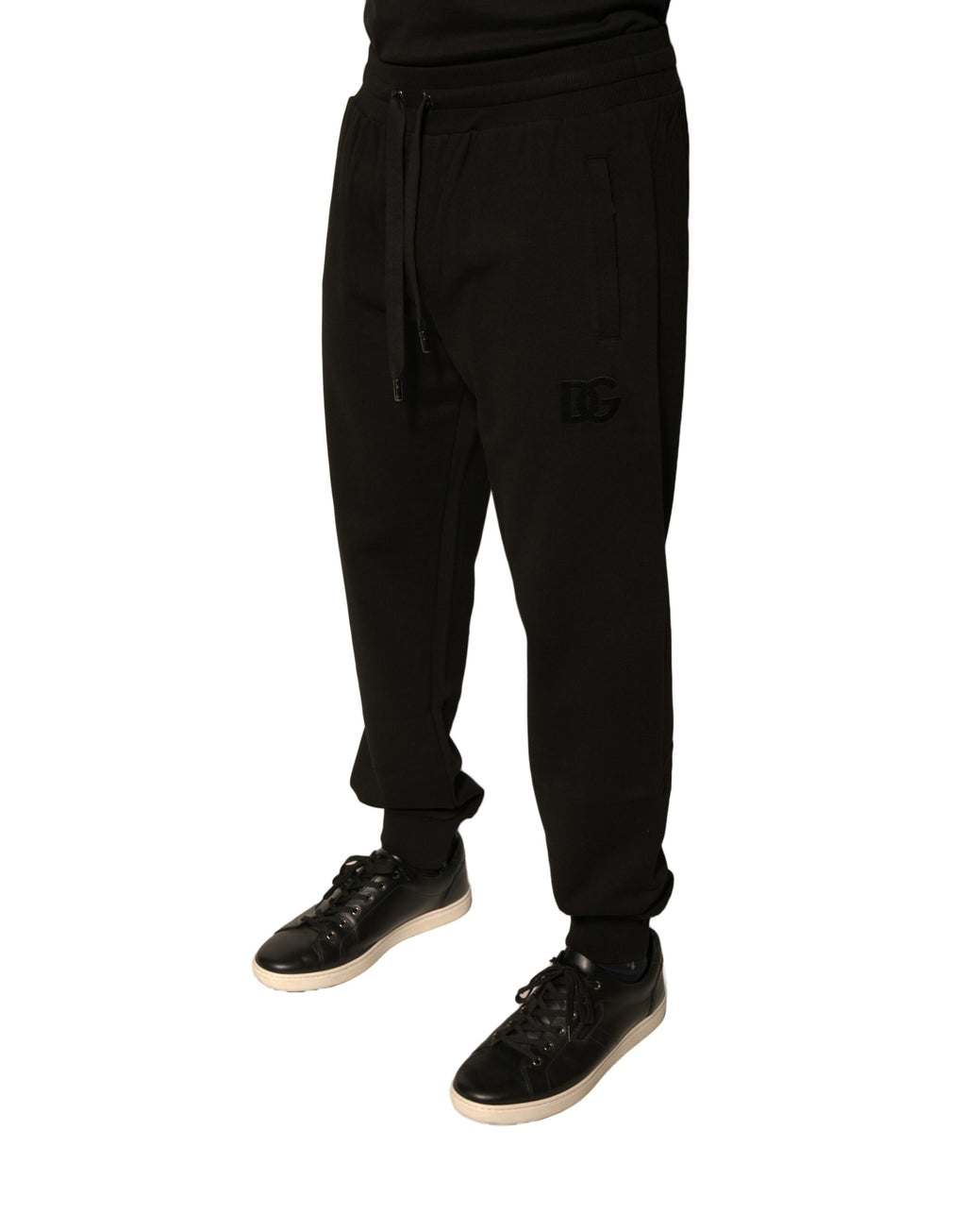 Pantalon jogging noir en coton pour homme de Dolce & Gabbana, sweatpants décontractés avec logo sur la jambe.