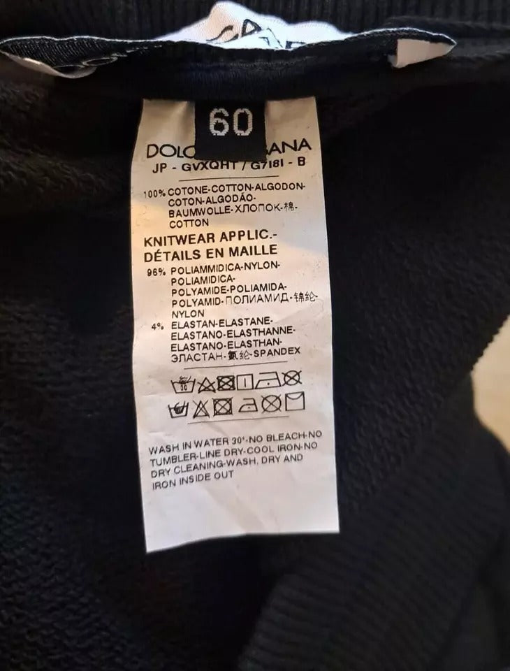 Pantalon jogger homme Dolce & Gabbana en coton noir, pantalon de sport décontracté avec ceinture élastique et poches latérales.