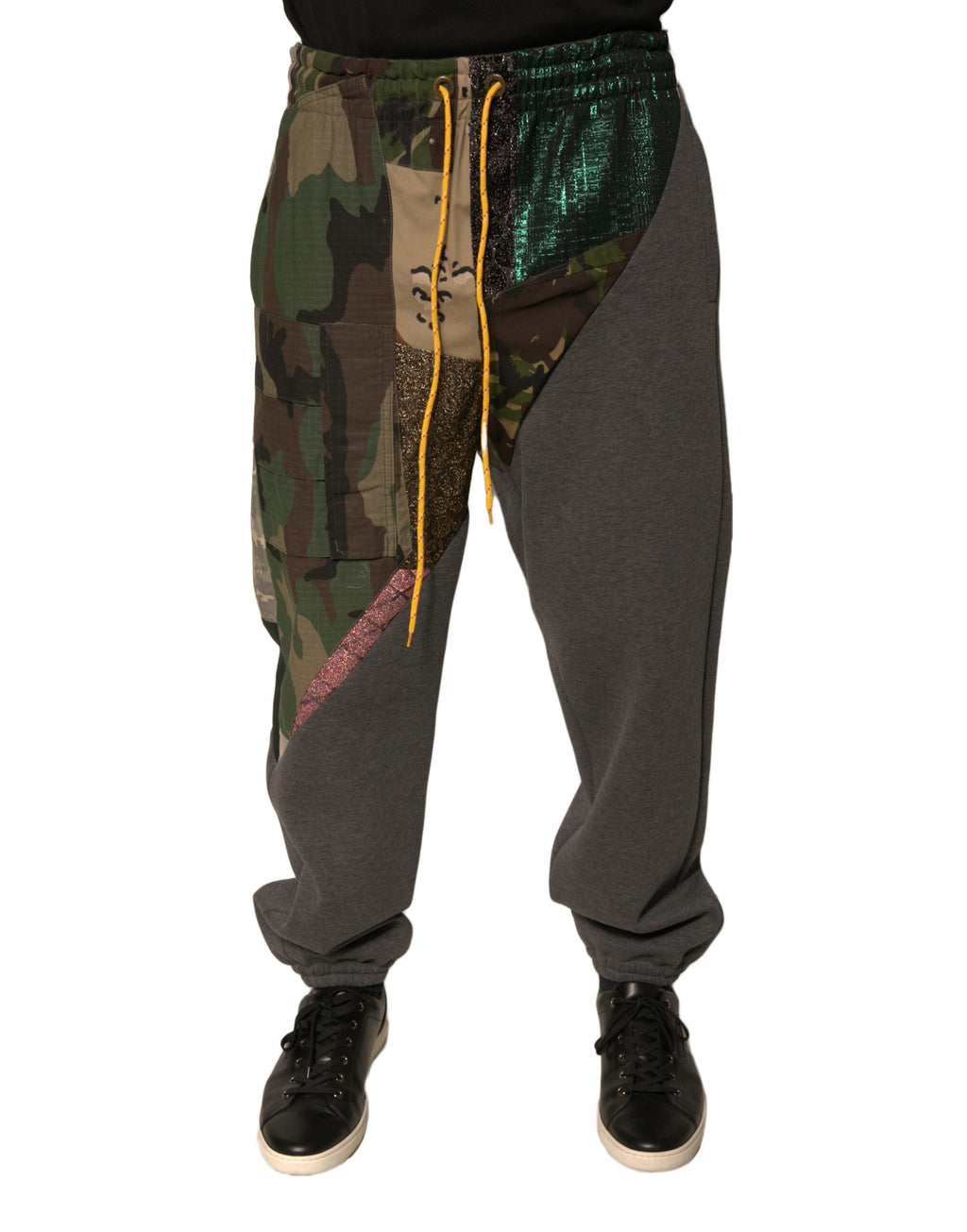 Pantalons jogger en coton Dolce & Gabbana à patchwork multicolore, avec ceinture élastique et poches latérales.
