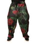 Pantalons de jogging noirs Dolce & Gabbana en polyester avec motif floral, détails confort et style élégant.