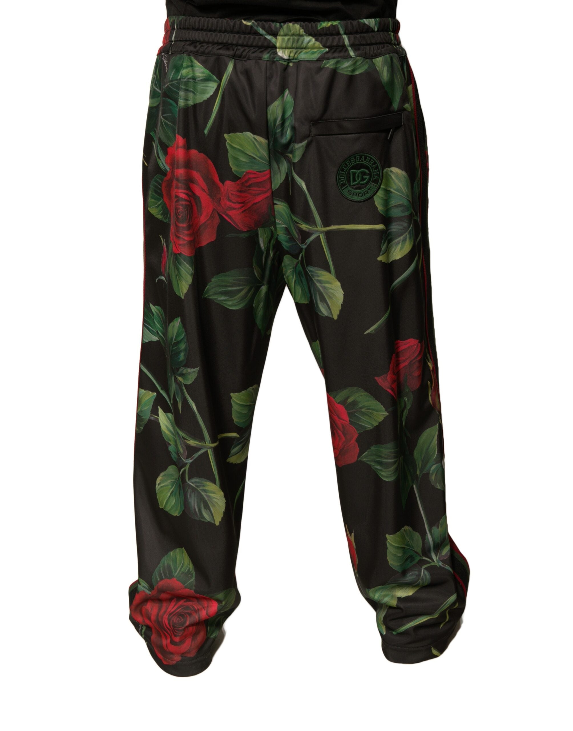 Pantalon de jogging noir en polyester Dolce & Gabbana avec motif floral, confortable et tendance, visible sur l'image.