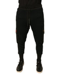 Pantalon jogging cargo en coton noir de Dolce & Gabbana, style décontracté avec poches latérales et taille élastique.