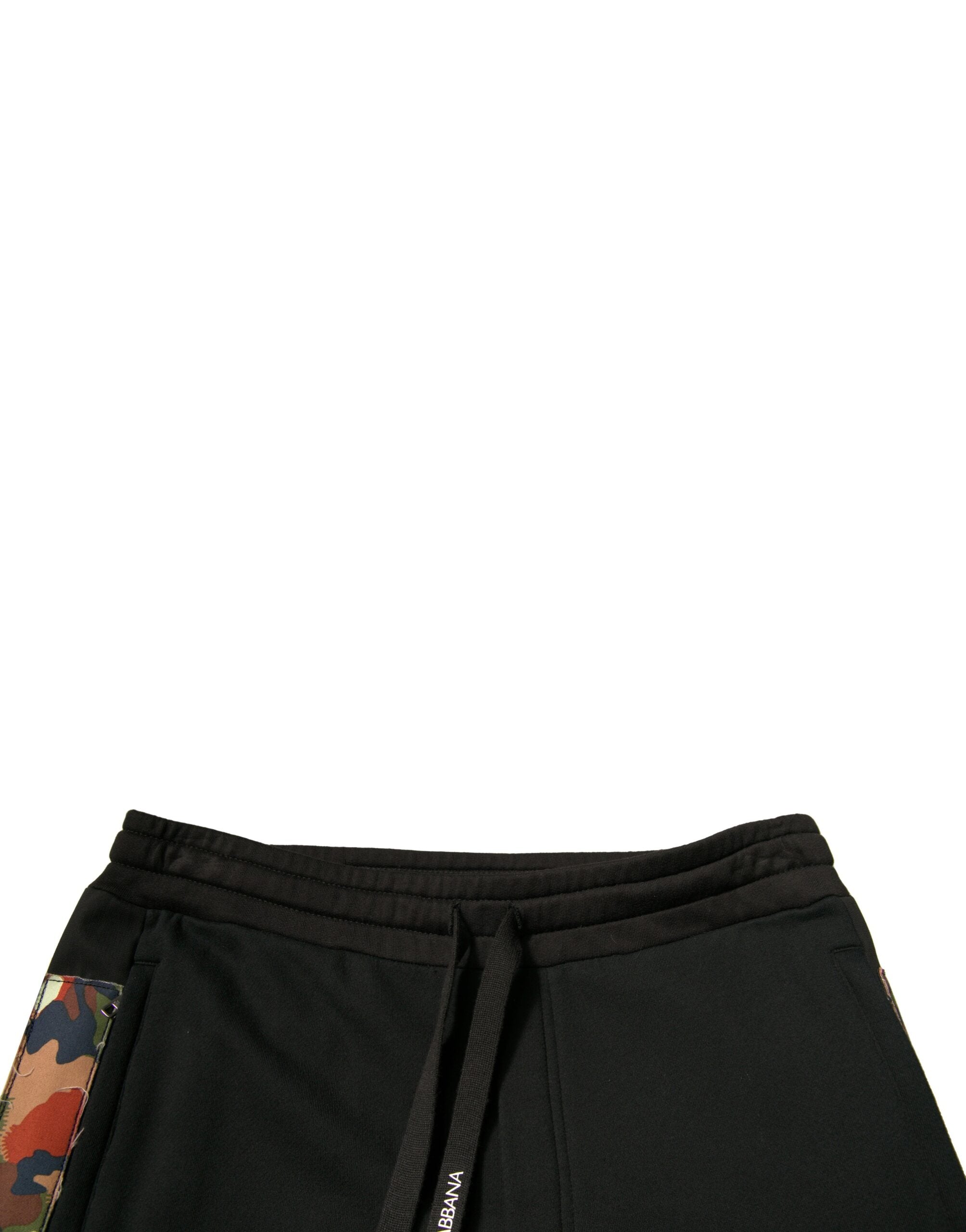 Pantalon jogging cargo noir en coton Dolce & Gabbana avec poches latérales et taille élastique, vue de face.
