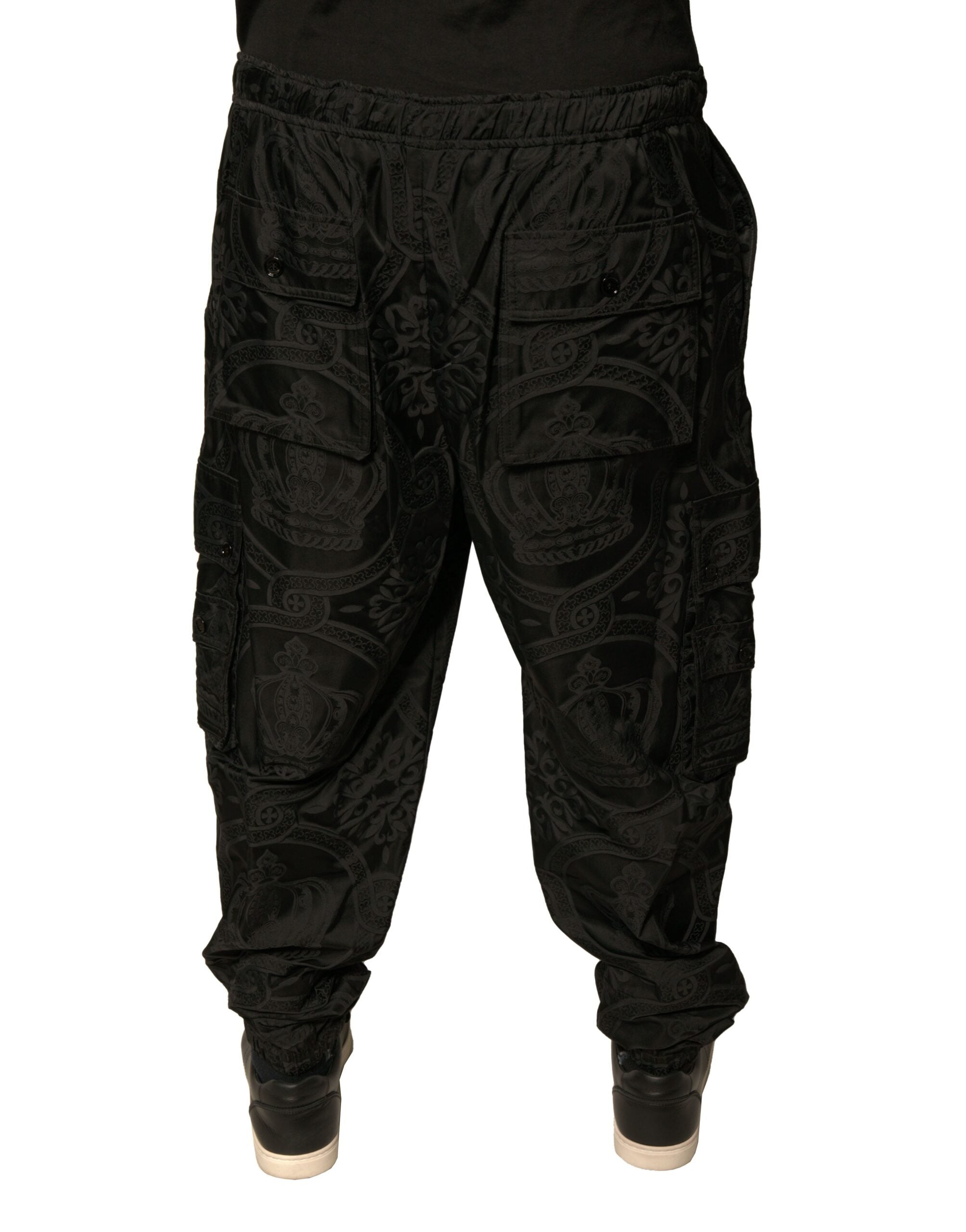 Pantalon de jogging noir Dolce & Gabbana en nylon avec motif couronne, style décontracté et moderne pour homme.