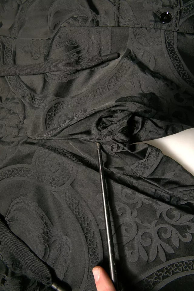 Pantalons jogging en nylon noir Dolce & Gabbana avec logo de couronne, style décontracté et moderne.