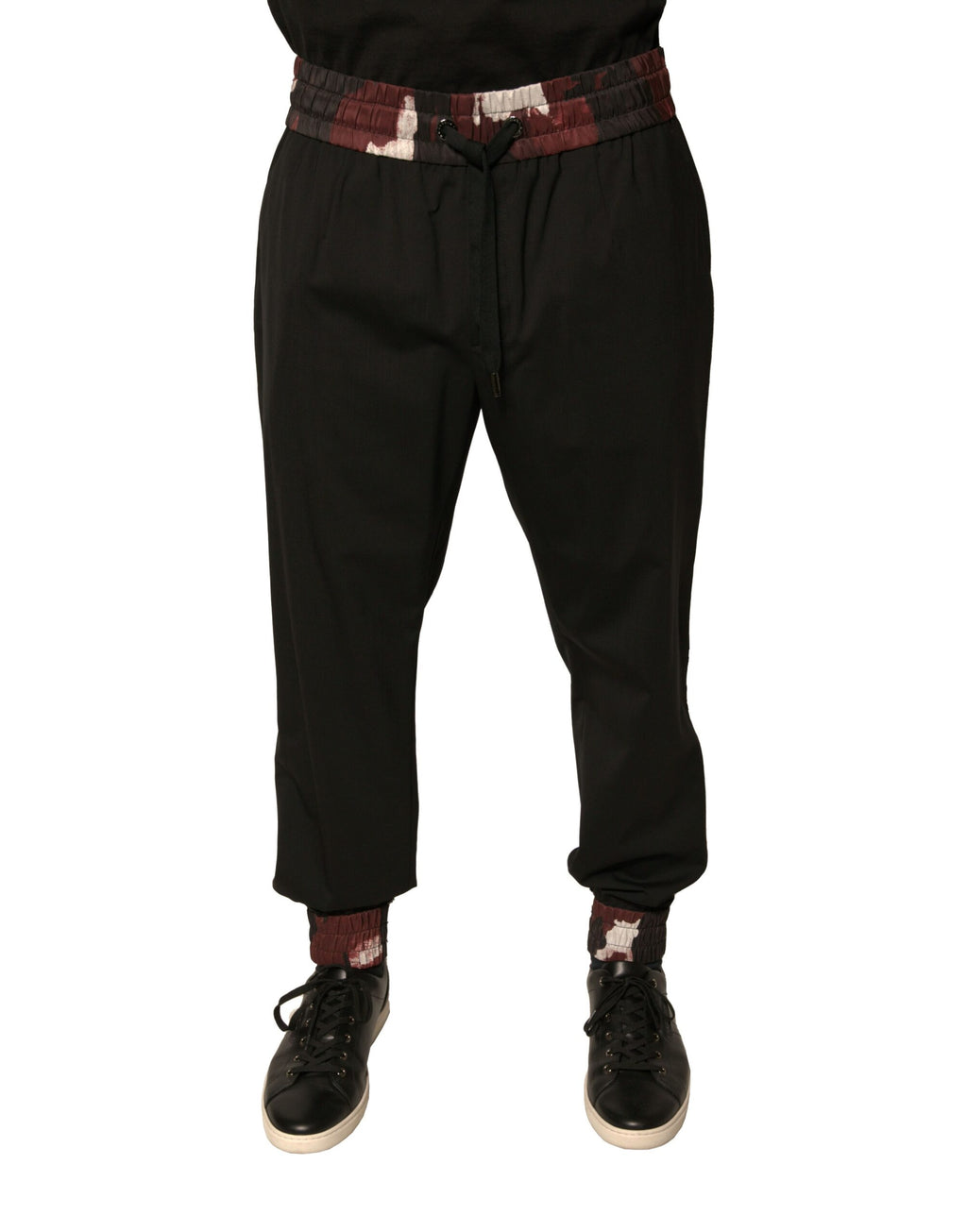 Pantalon jogger en laine camouflage noire de Dolce & Gabbana, style décontracté et tendance pour homme.