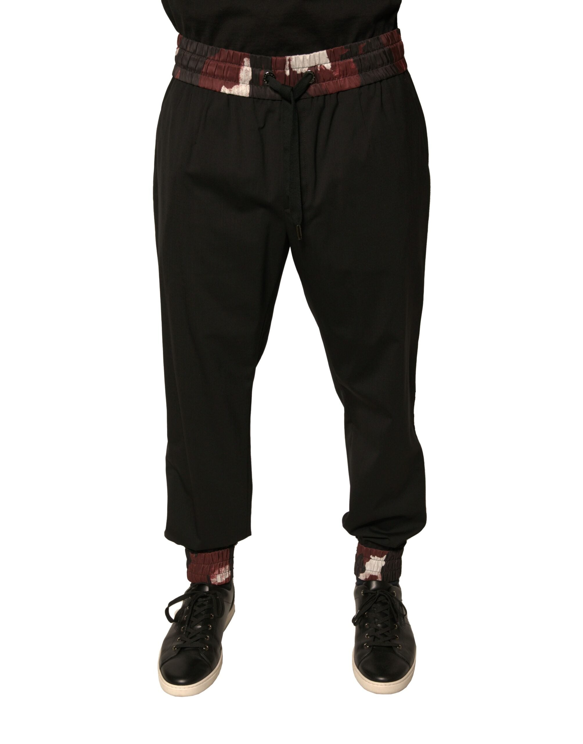 Pantalon jogger en laine camouflage noire de Dolce & Gabbana, style décontracté et tendance pour homme.