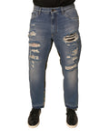 Jeans déchirés droits et cropped en denim bleu de Dolce & Gabbana, style décontracté et tendance.
