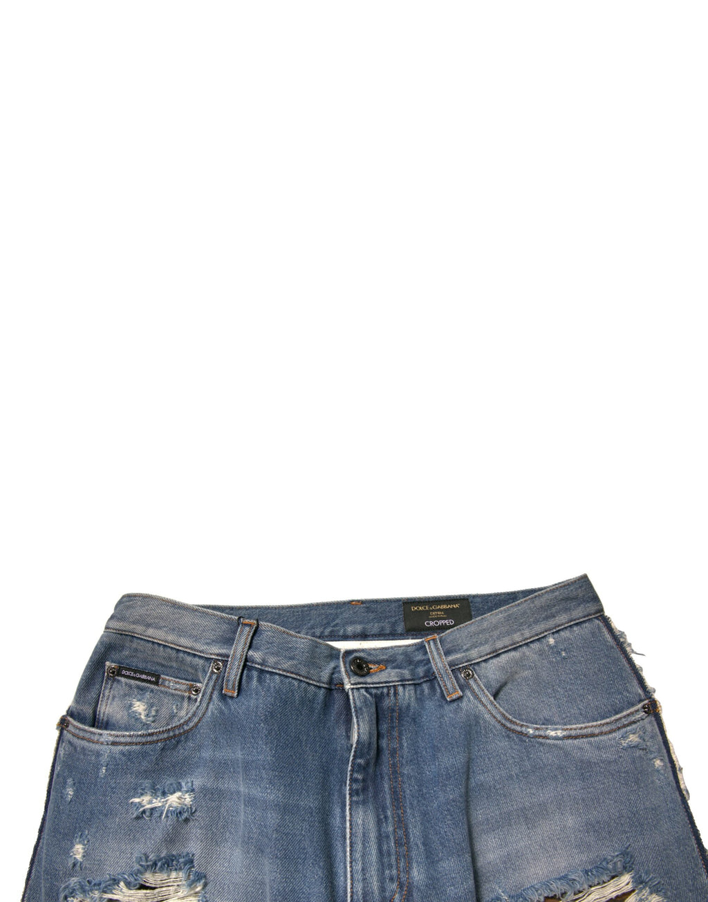 Jeans en denim droit coupé court de couleur bleue, tachetés et déchirés, de la marque Dolce & Gabbana.