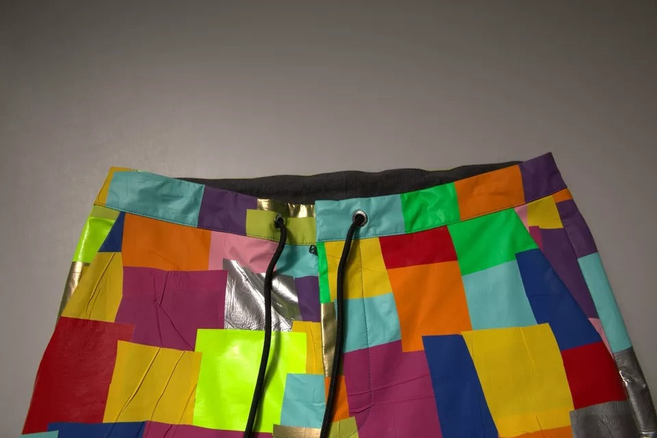 Pantalon cargo homme Dolce & Gabbana en coton patchwork multicolore, style décontracté avec poches latérales.