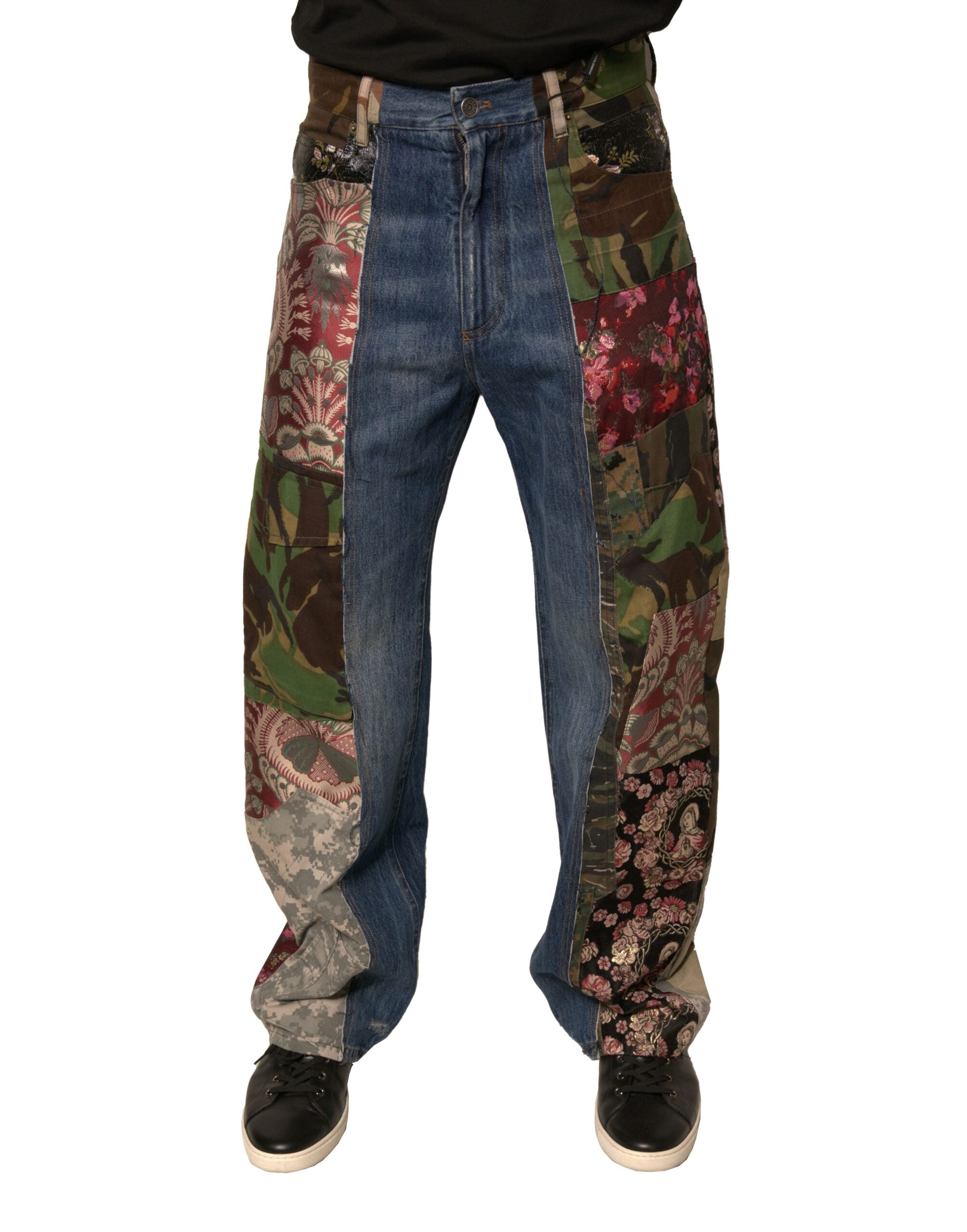 Jeans en denim droit Dolce & Gabbana en coton à patchwork bleu, visibles en détail sur l'image.
