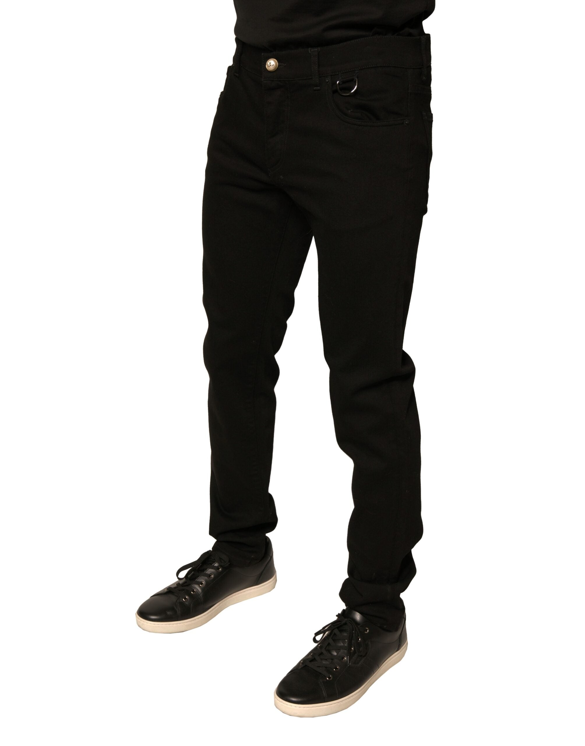 Jeans skinny en denim noir Dolce & Gabbana avec logo en coton stretch, style ajusté et moderne.