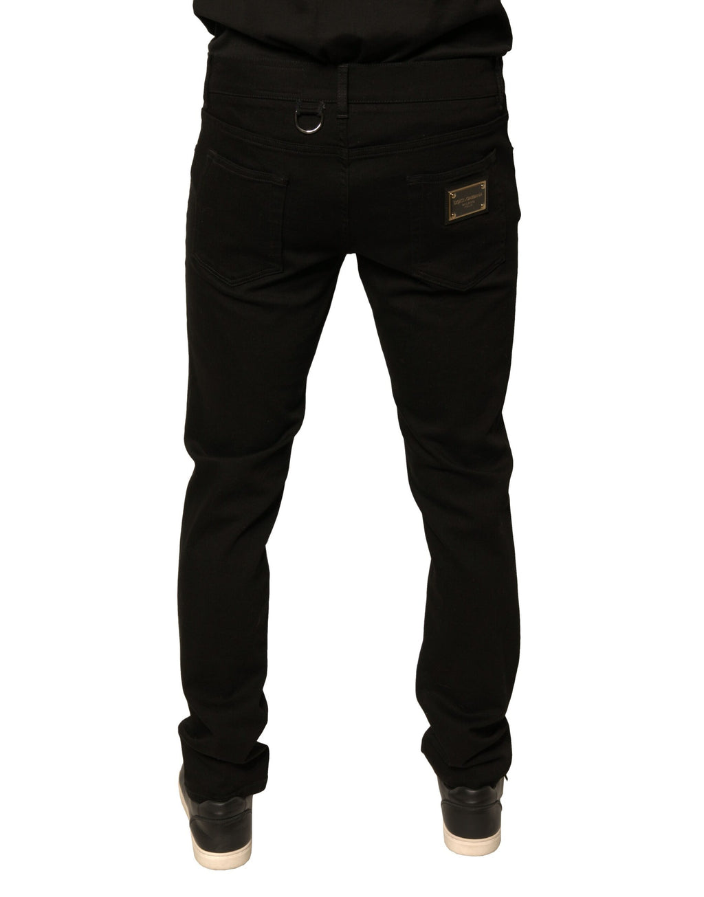 Jeans skinny en denim coton stretch noir Dolce & Gabbana avec logo visible, ajustés et tendance pour un look moderne.