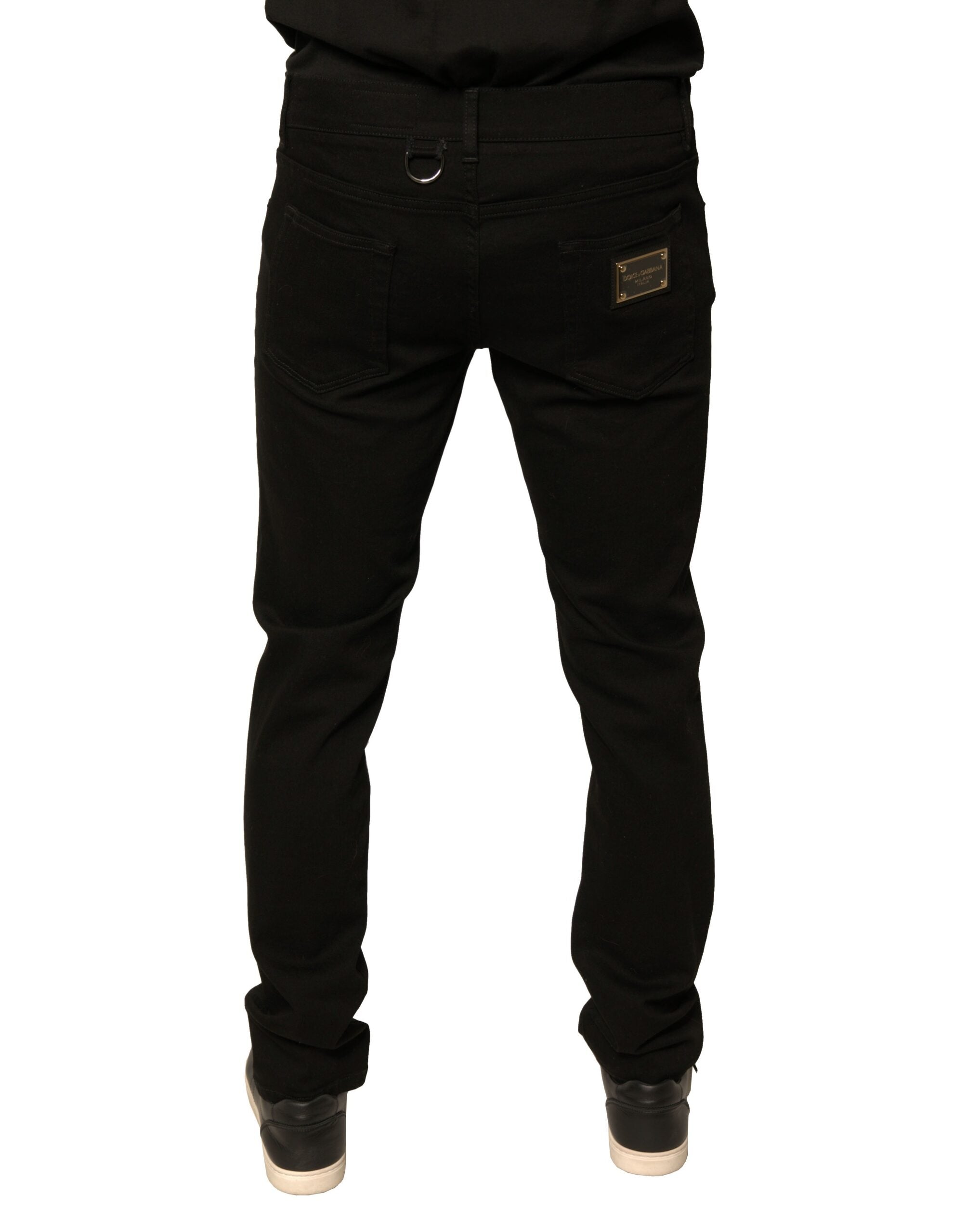 Jeans skinny en denim coton stretch noir Dolce & Gabbana avec logo visible, ajustés et tendance pour un look moderne.