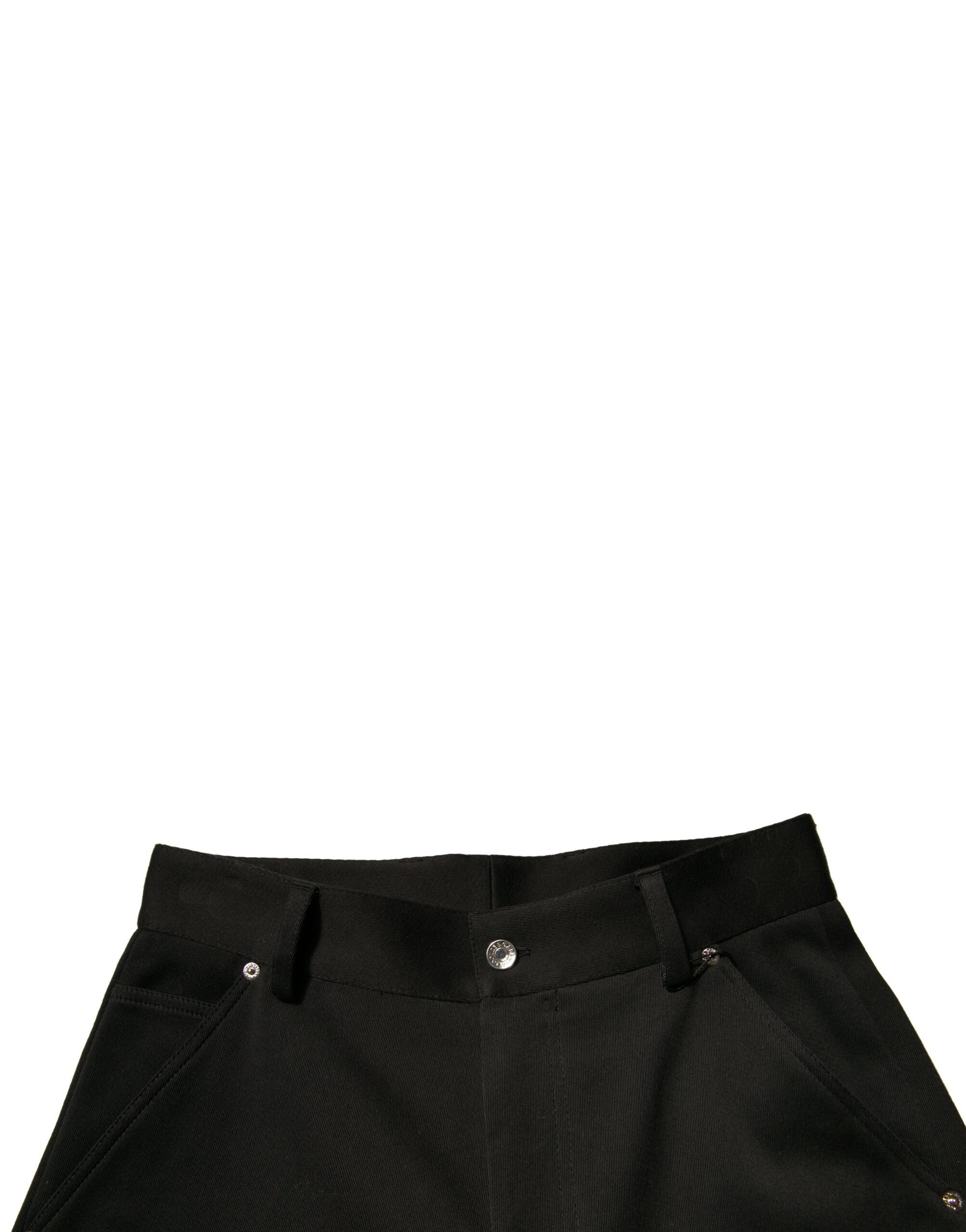 Pantalon noir en coton Dolce & Gabbana à taille mi-haute et coupe cropped, visible en détail dans l'image.
