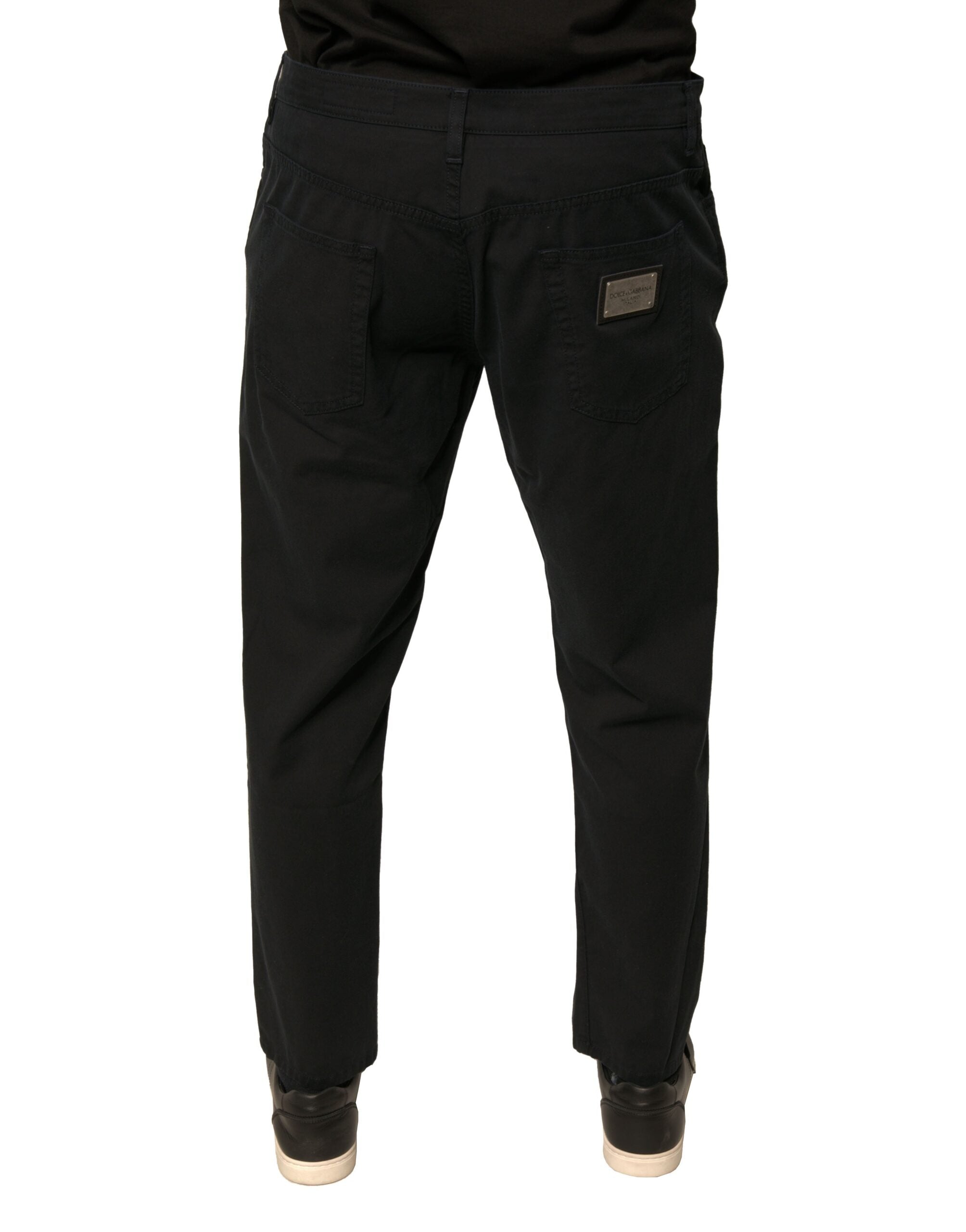 Jeans skinny en denim stretch noir Dolce & Gabbana avec logo brodé, coupe ajustée et détails modernes.