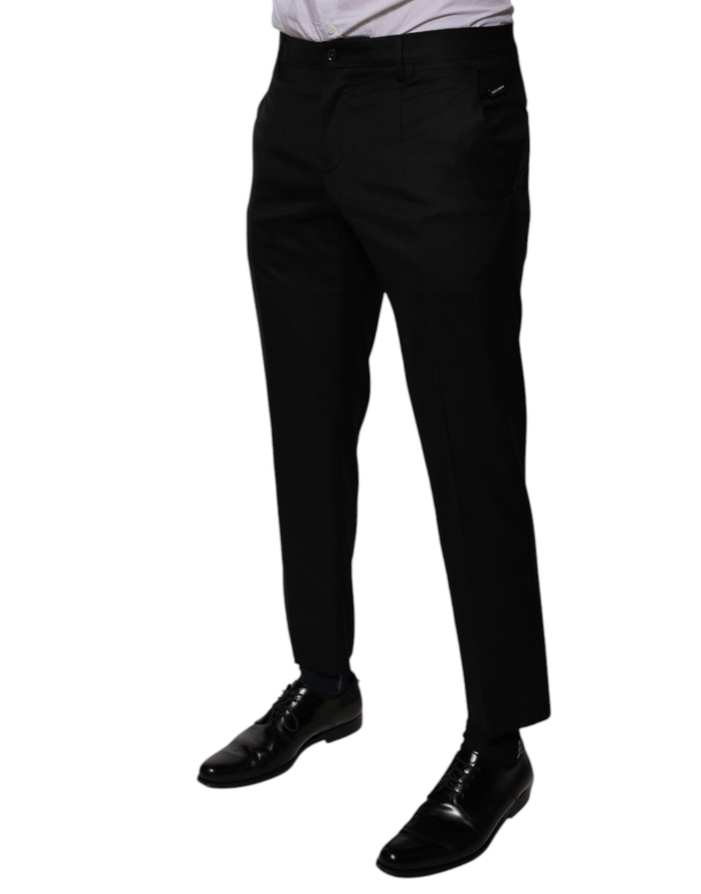 Pantalons formels noirs en laine Dolce & Gabbana, coupe tapered, pour homme, détails élégants, tissu de qualité.