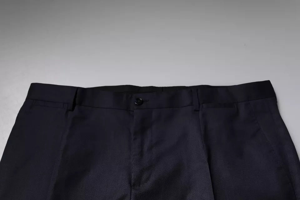 Pantalon de costume formel bleu foncé Dolce & Gabbana, coupe tapered, en tissu élégant, visible sur l'image.