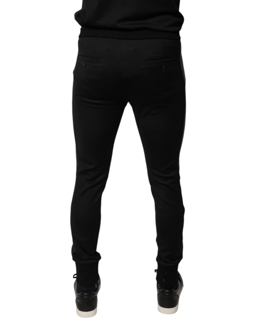 Pantalons Slim Fit en laine noire Dolce & Gabbana avec embellissements en fer à cheval, style élégant et sophistiqué.