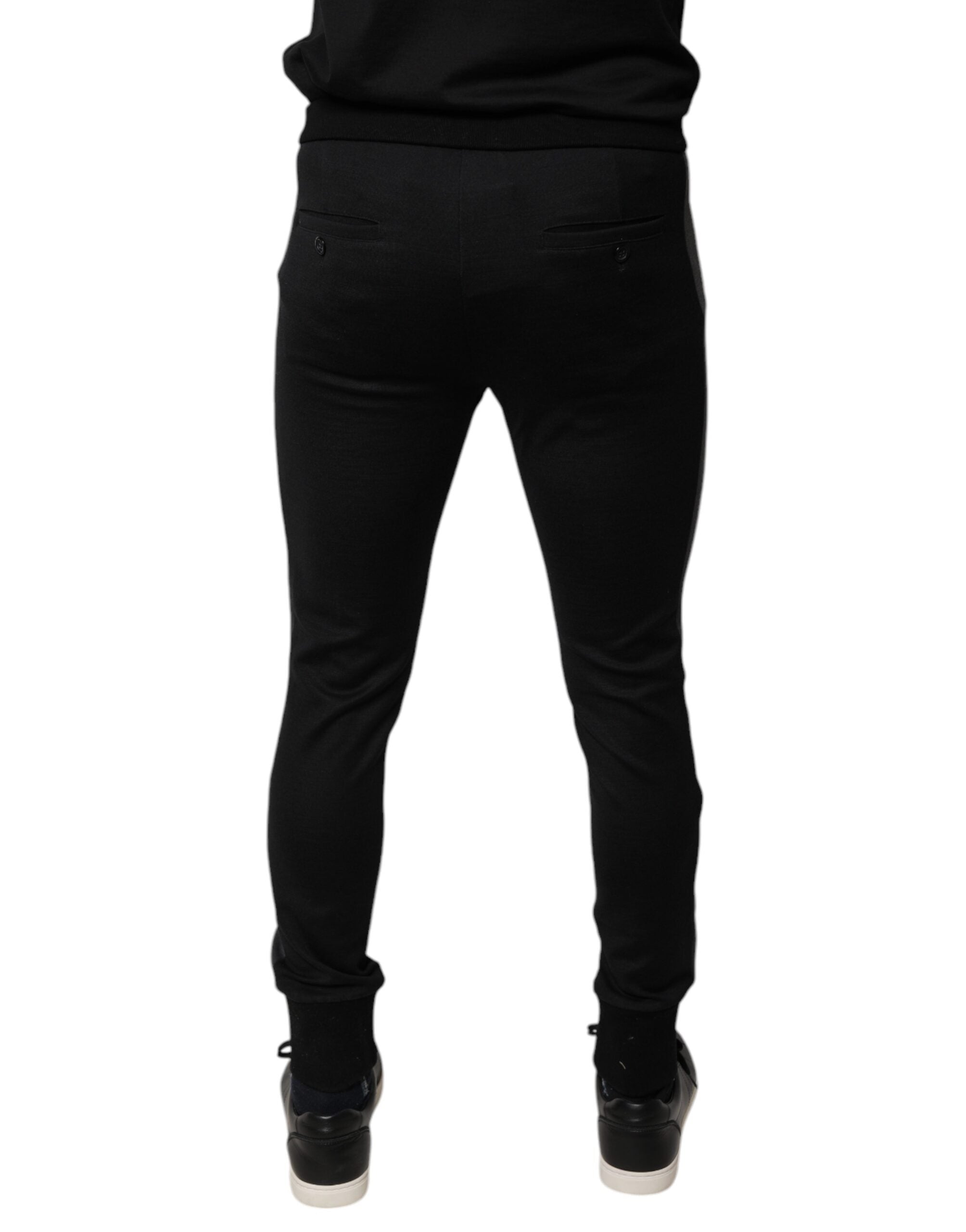 Pantalons Slim Fit en laine noire Dolce & Gabbana avec embellissements en fer à cheval, style élégant et sophistiqué.
