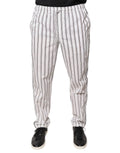 Pantalon skinny en coton blanc à rayures Dolce & Gabbana, vue de face, avec ceinture et poches visibles.
