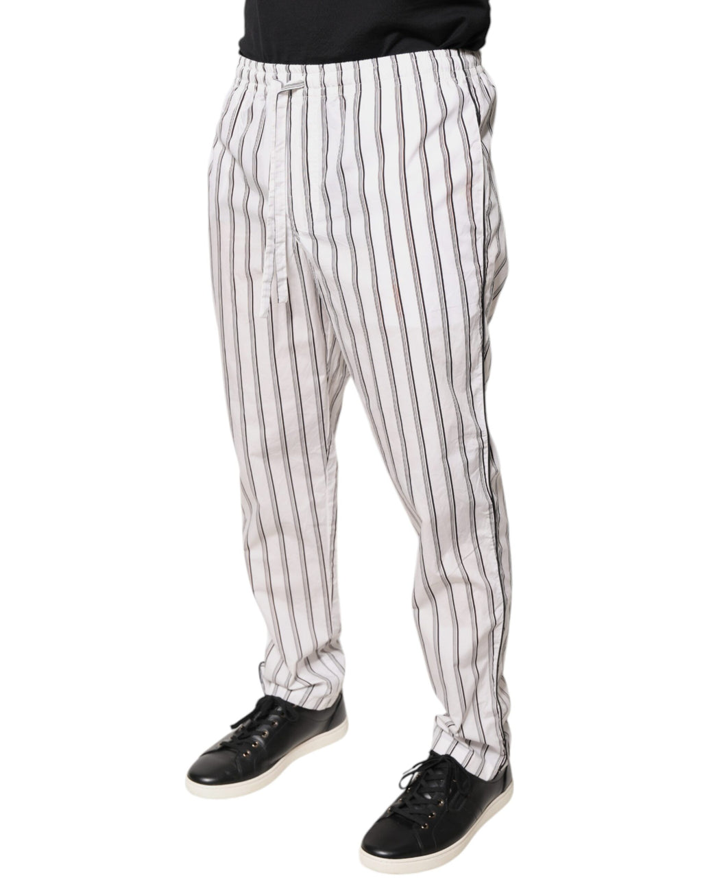 Pantalon skinny en coton blanc à rayures de Dolce & Gabbana, style élégant pour femme, vue de face.