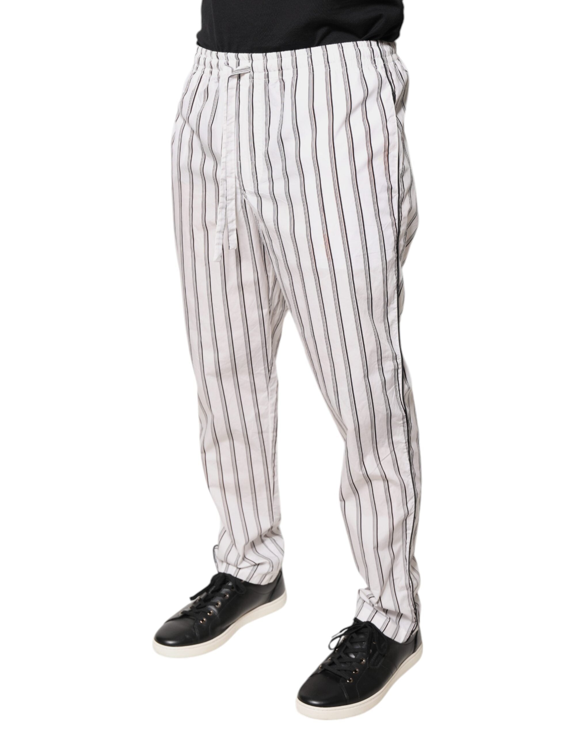 Pantalon skinny en coton blanc à rayures de Dolce & Gabbana, style élégant pour femme, vue de face.