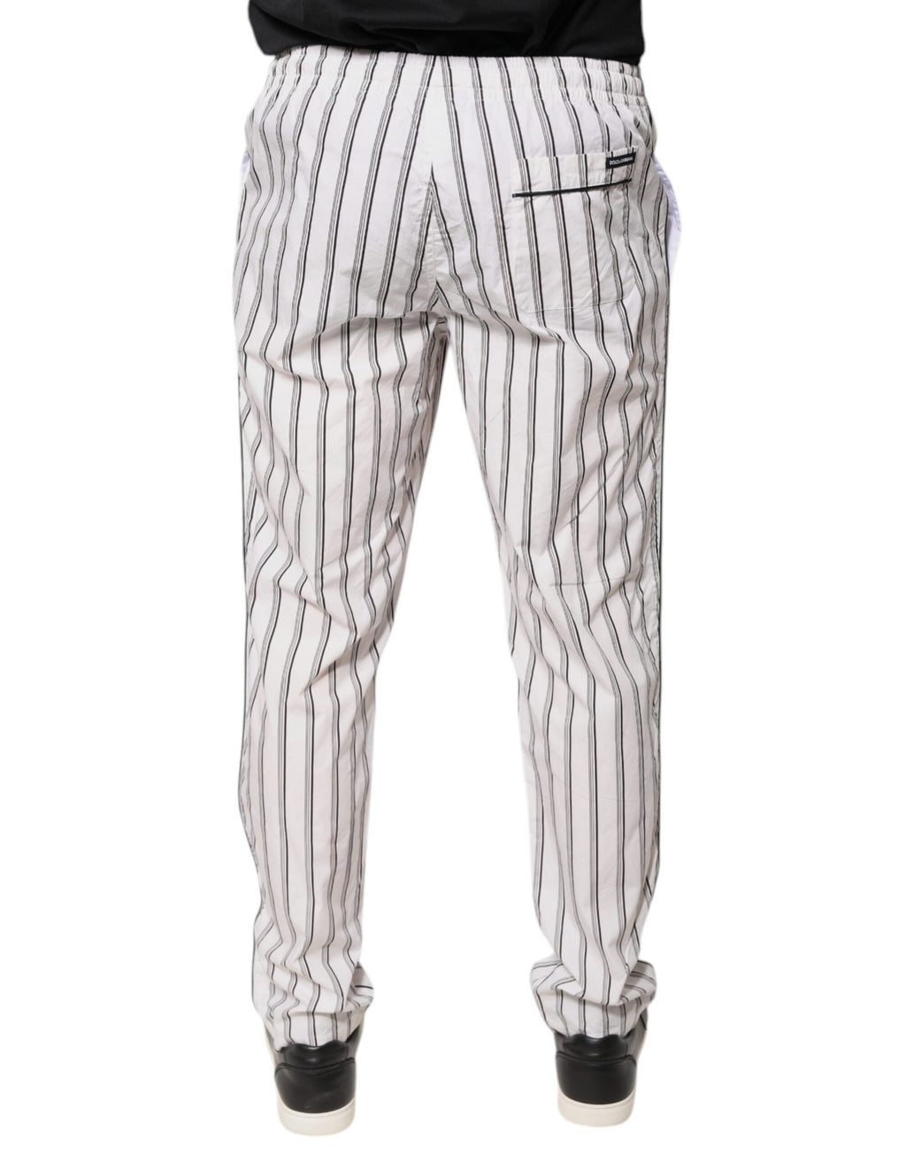 Pantalon skinny en coton blanc à rayures Dolce & Gabbana, style élégant et ajusté, vue de face sur le produit.