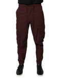 Pantalon cargo jogger Dolce & Gabbana en coton bordeaux avec poches sur le côté, style décontracté et confortable.