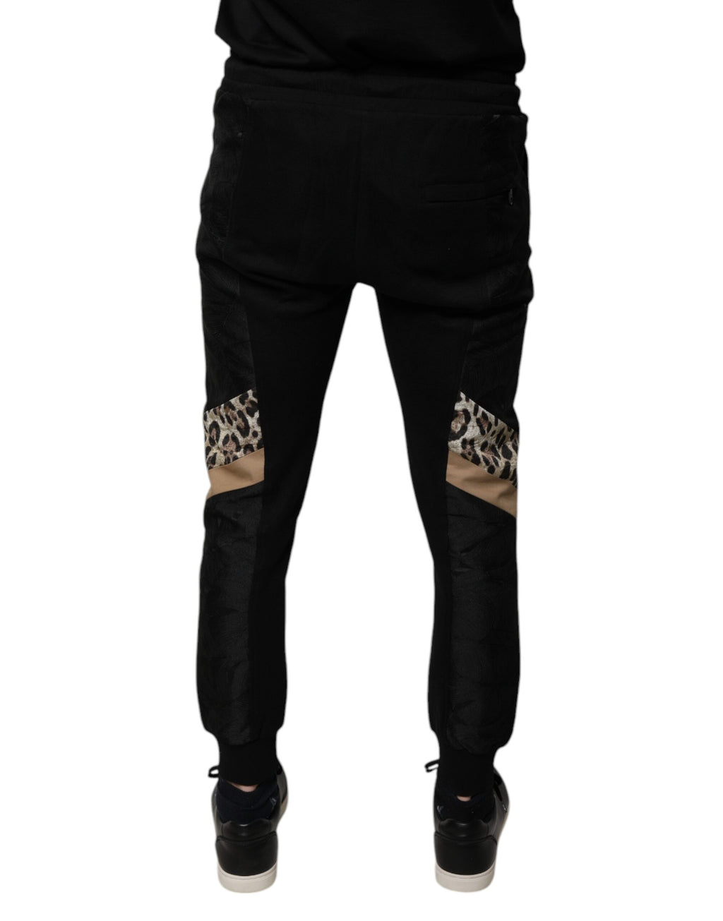 Pantalons jogger slim noir à motif léopard de Dolce & Gabbana, coupe ajustée et style tendance.