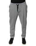 Pantalon skinny Dolce & Gabbana à motif pied-de-poule noir et blanc, coupe ajustée et élégante.