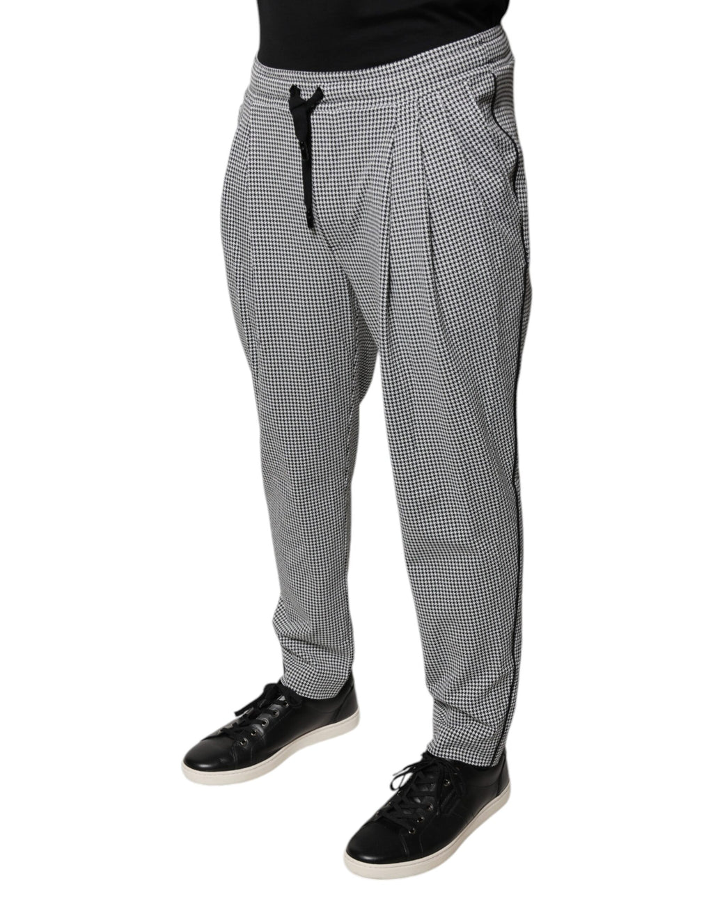 Pantalon skinny Dolce & Gabbana à motif pied-de-poule noir et blanc, coupe ajustée et élégante pour femme.