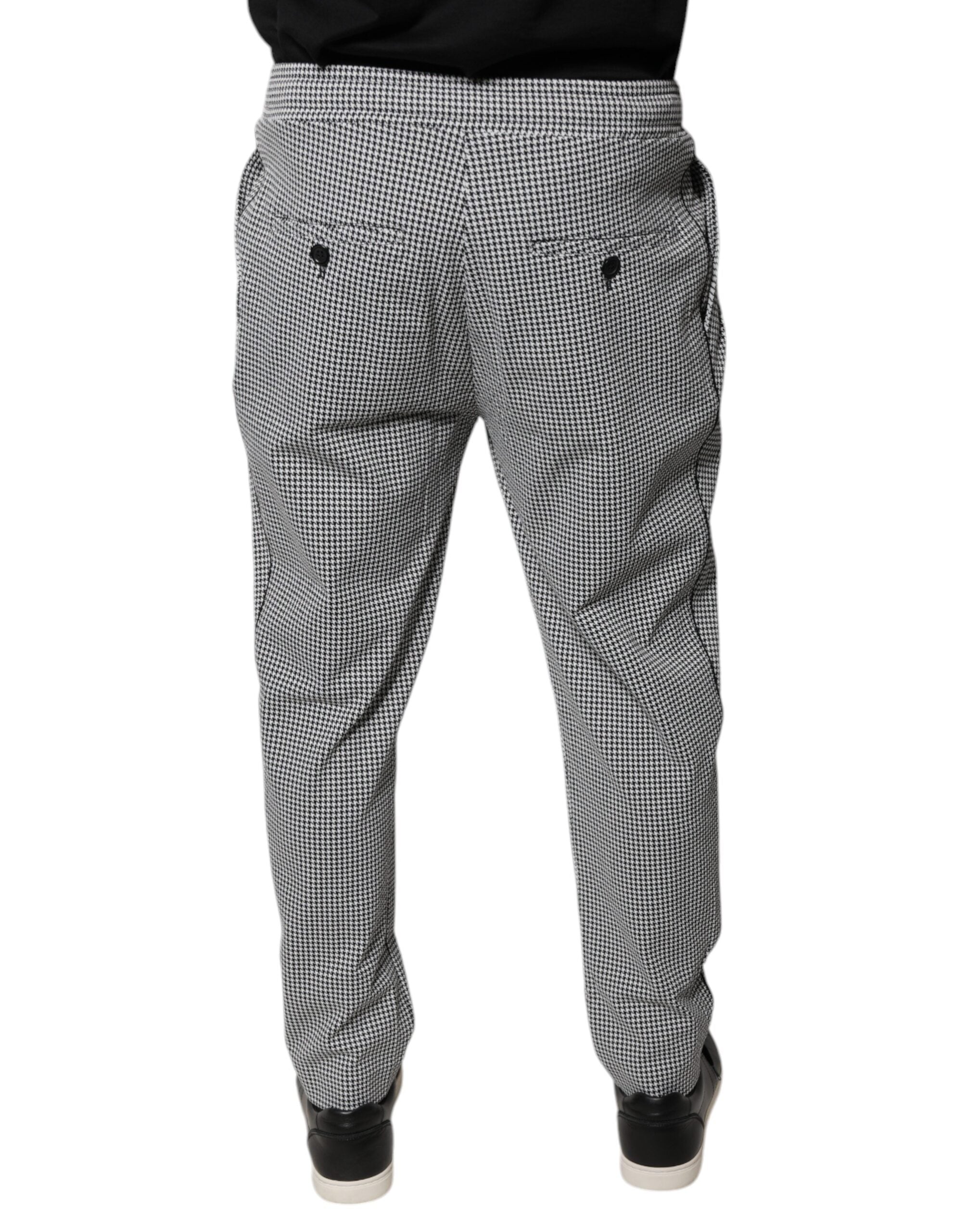 Pantalon skinny à carreaux pied-de-poule noir et blanc de Dolce & Gabbana, style élégant et ajusté.
