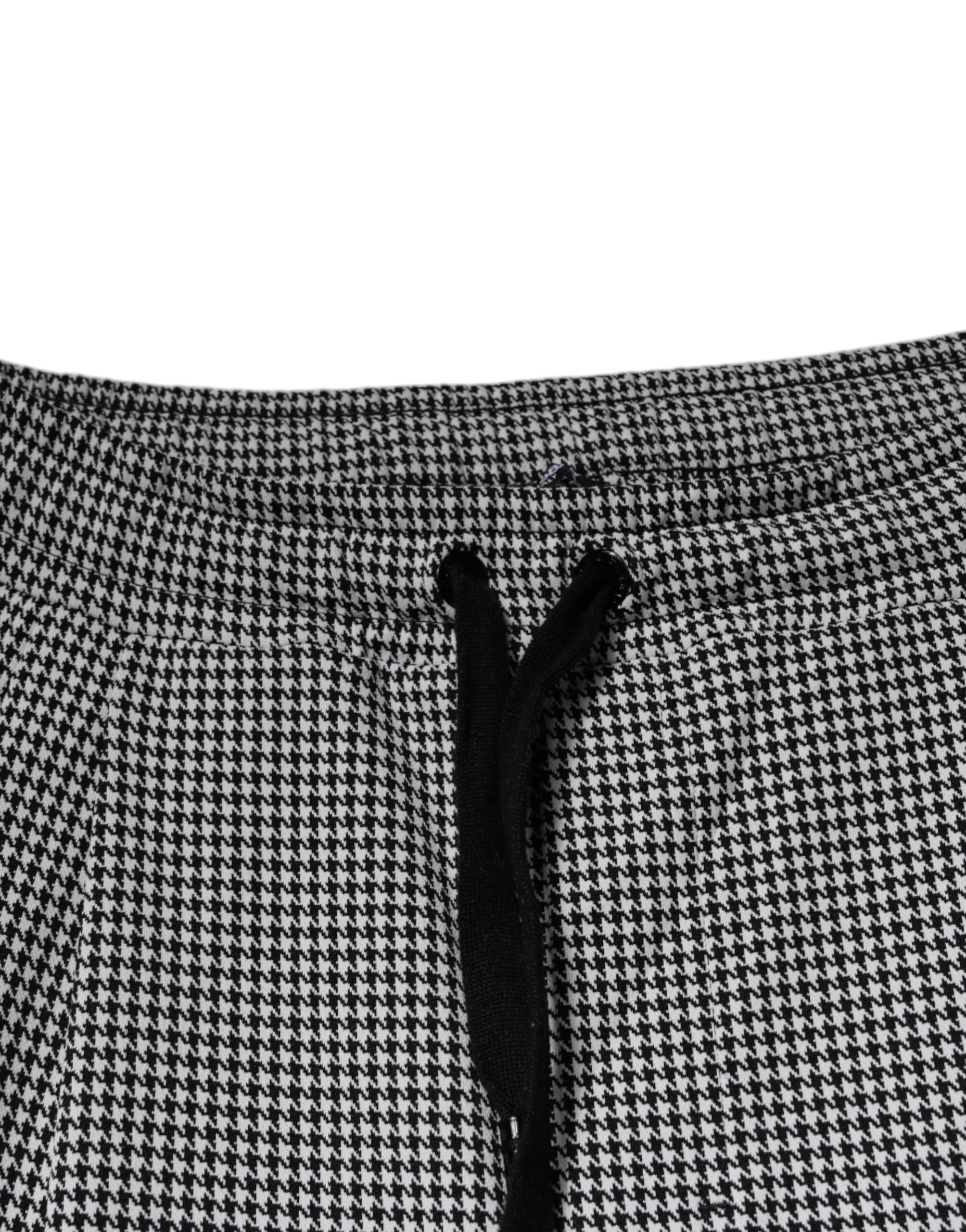 Pantalon skinny Dolce & Gabbana à motif pied-de-poule noir et blanc, style élégant et ajusté pour femme.