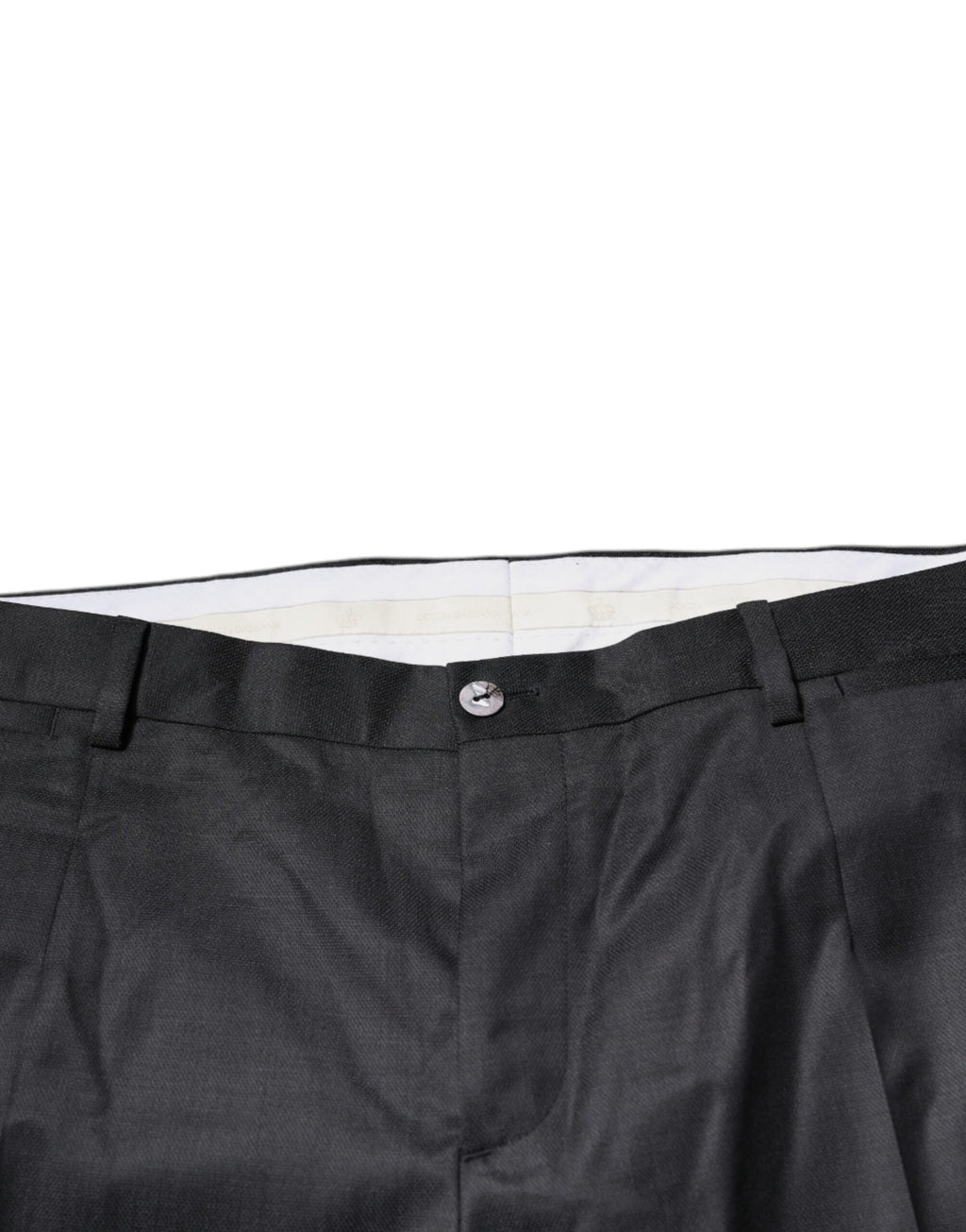 Pantalon formel en laine noire Dolce & Gabbana, coupe tapered, vue de face sur un fond neutre.
