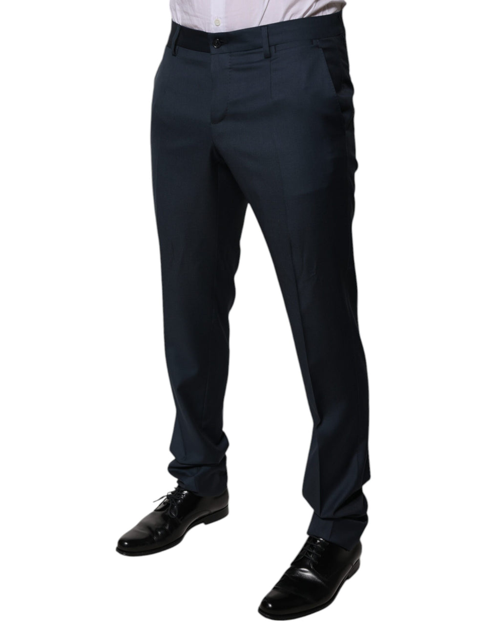 Pantalon formel en laine bleue Dolce & Gabbana, coupe tapered, visible sur une mannequin.