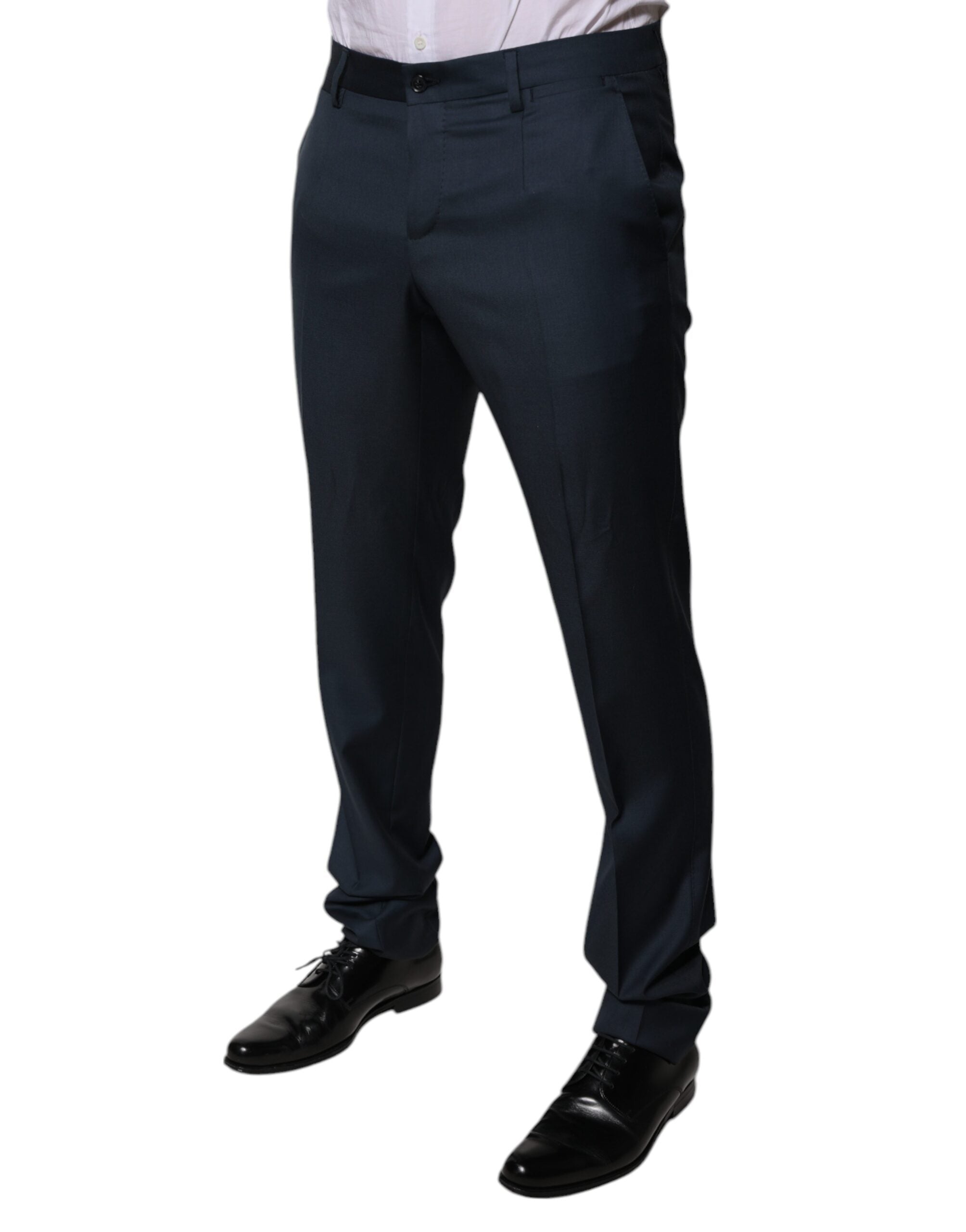 Pantalon formel en laine bleue Dolce & Gabbana, coupe tapered, visible sur une mannequin.