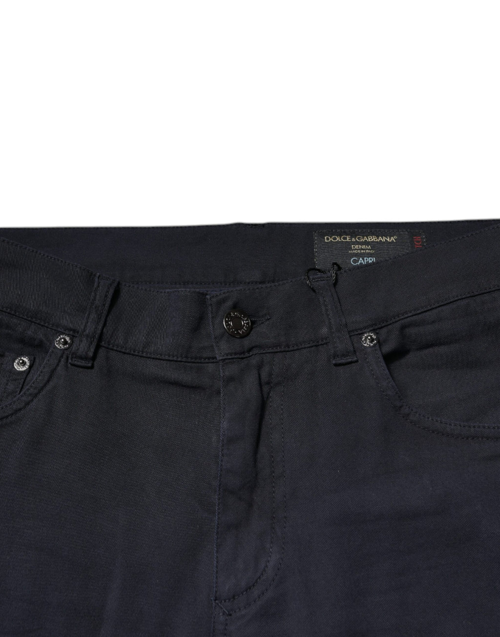 Jeans skinny en denim stretch noir Dolce & Gabbana avec logo en coton, ajustés et tendance, visibles sur l'image.