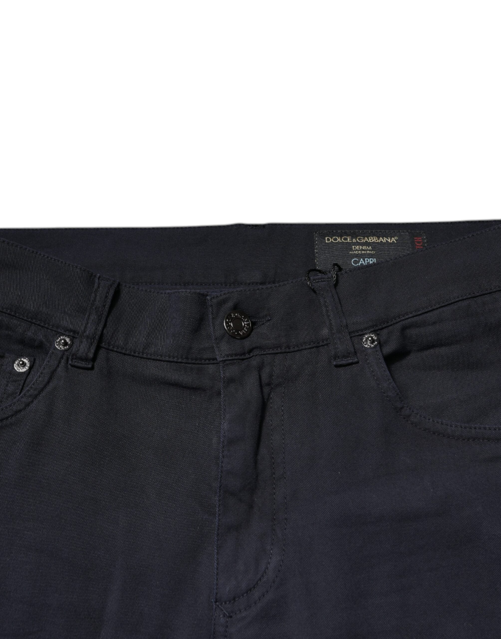 Jeans skinny en denim stretch noir Dolce & Gabbana avec logo en coton, ajustés et tendance, visibles sur l'image.