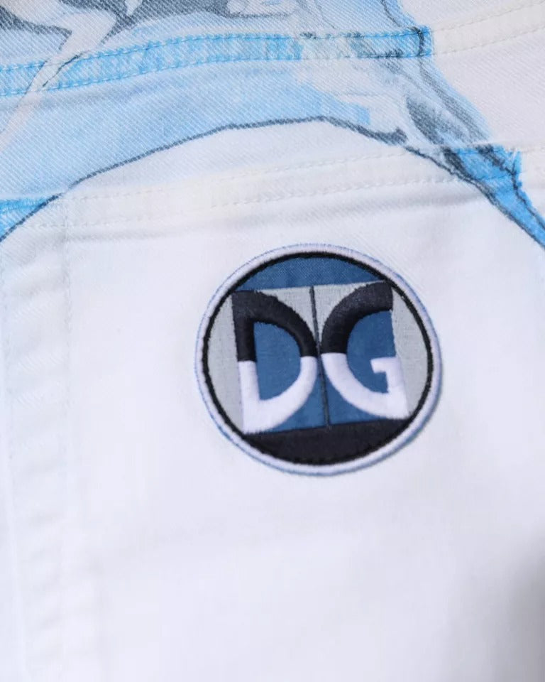 Jeans skinny en coton stretch blanc et bleu de Dolce & Gabbana, denim ajusté avec détails modernes visibles.