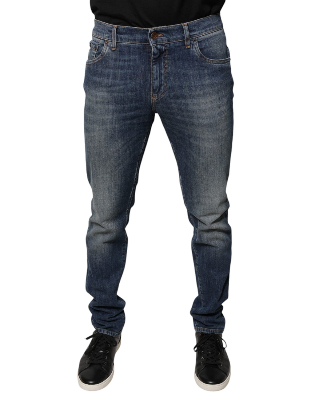 Jeans skinny en coton bleu Dolce & Gabbana avec logo DG en couronne, détail de la marque sur la poche arrière.