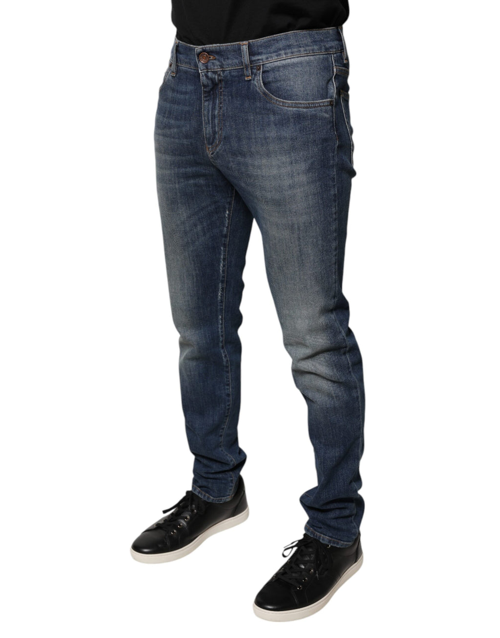 Jeans skinny en coton bleu Dolce & Gabbana avec logo couronne DG, visible sur l'image.