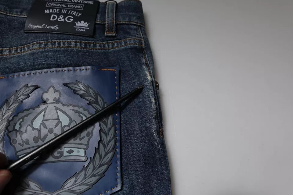 Jeans skinny en denim blanc Dolce & Gabbana avec logo couronne en coton, style élégant et moderne, vue de face.