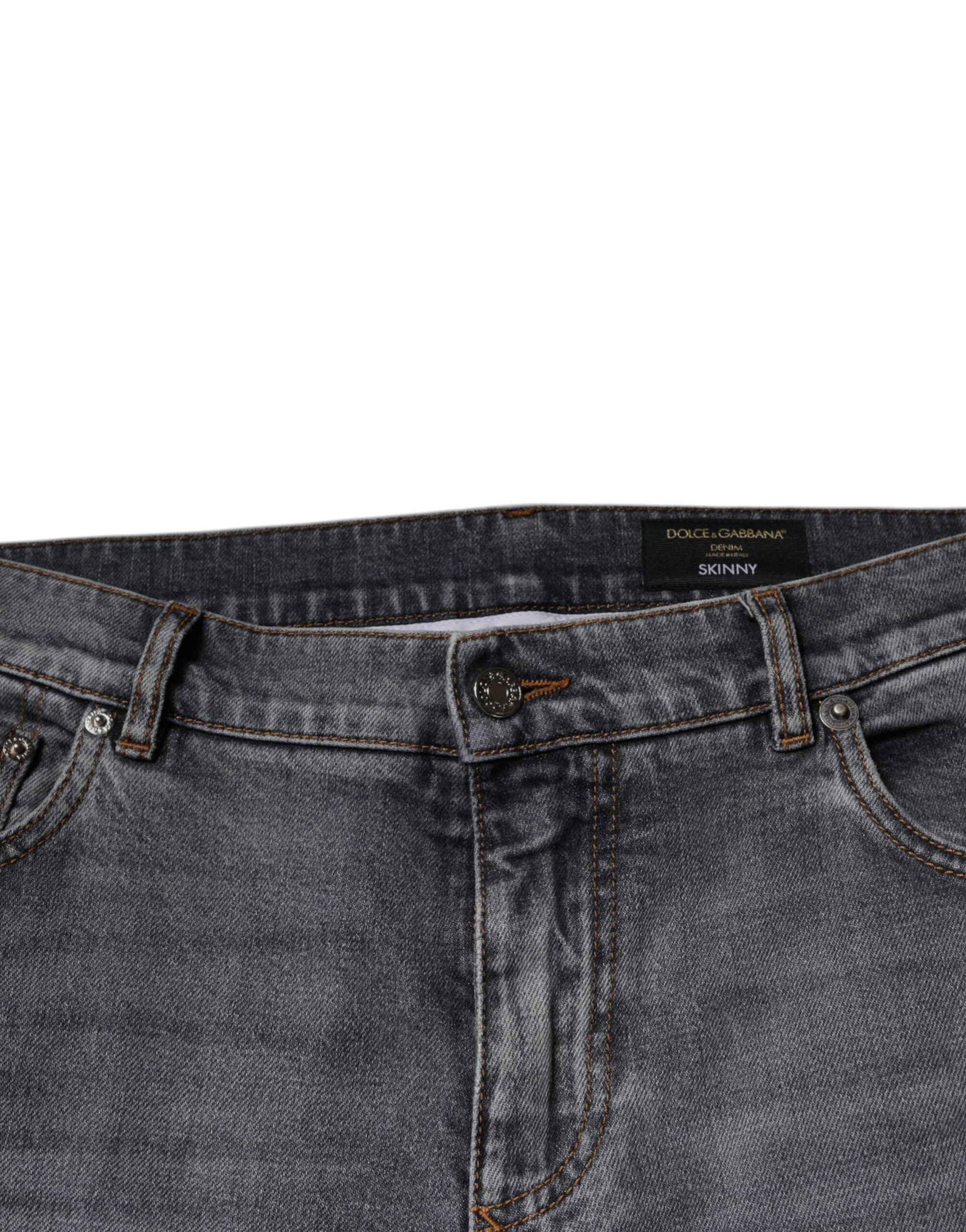 Jean skinny en denim extensible gris avec logo Dolce & Gabbana, coupe ajustée et détails élégants.