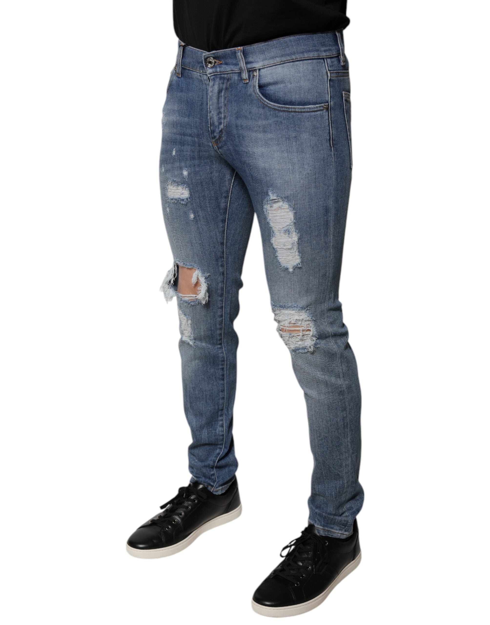 Jeans skinny en denim coton déchiré bleu de Dolce & Gabbana, coupe extensible et style tendance.