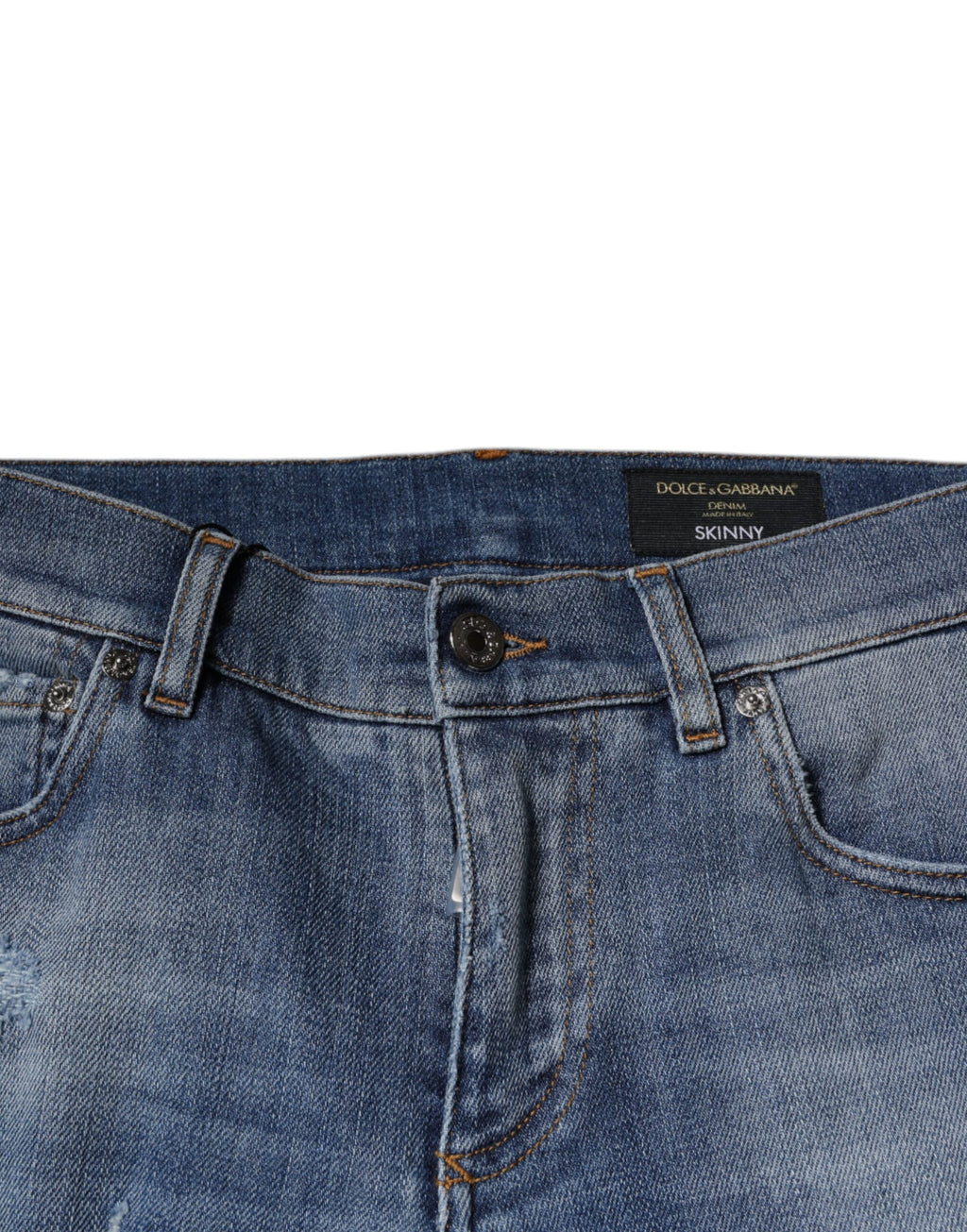 Jeans skinny en denim coton déchiré bleu Dolce & Gabbana, coupe stretch, détails usés et finition tendance.