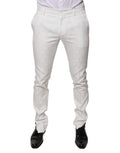 Pantalon de costume blanc en coton Dolce & Gabbana, coupe tapered, pour homme, détails élégants et couture raffinée.